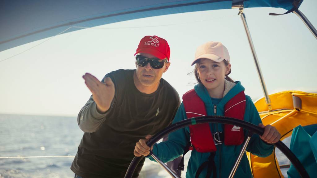Girl learning how to sail